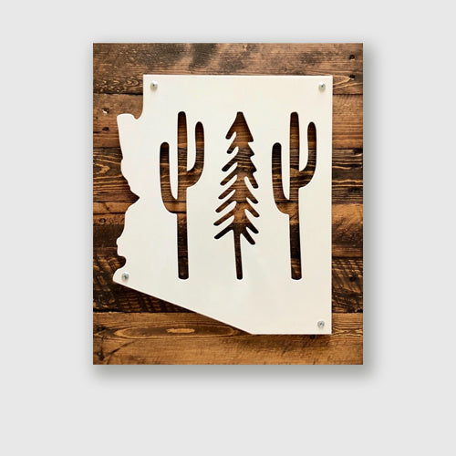 Arizona wilderness metal sign on wood, cactus and pines