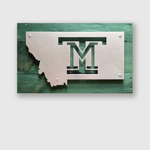 Montana Tech logo engraved in metal sign on upcycled pallet