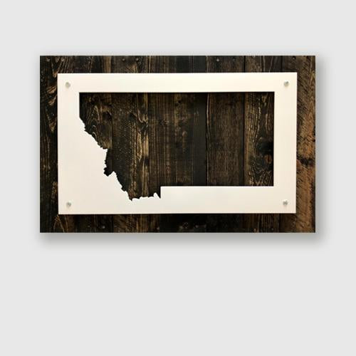 Metal wall sign of the state of Montana on upcycled wood